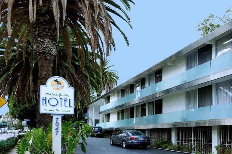 Highland Gardens Hotel front, with signage.